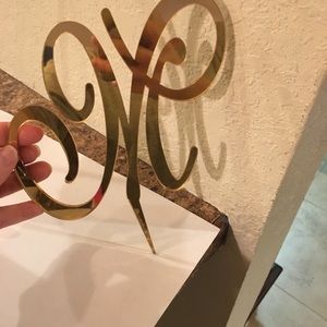 Monogram “M” gold cake topper